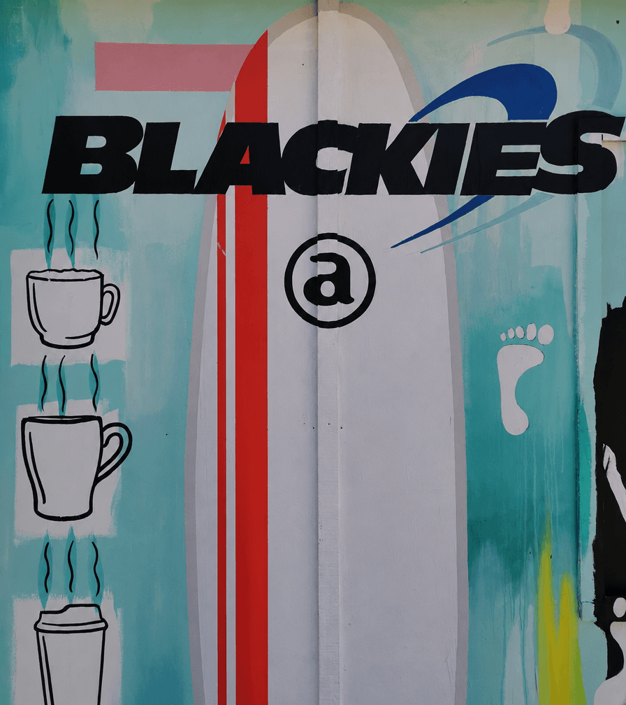 Surfboard mural at Blackies Cafe, Whangamatā